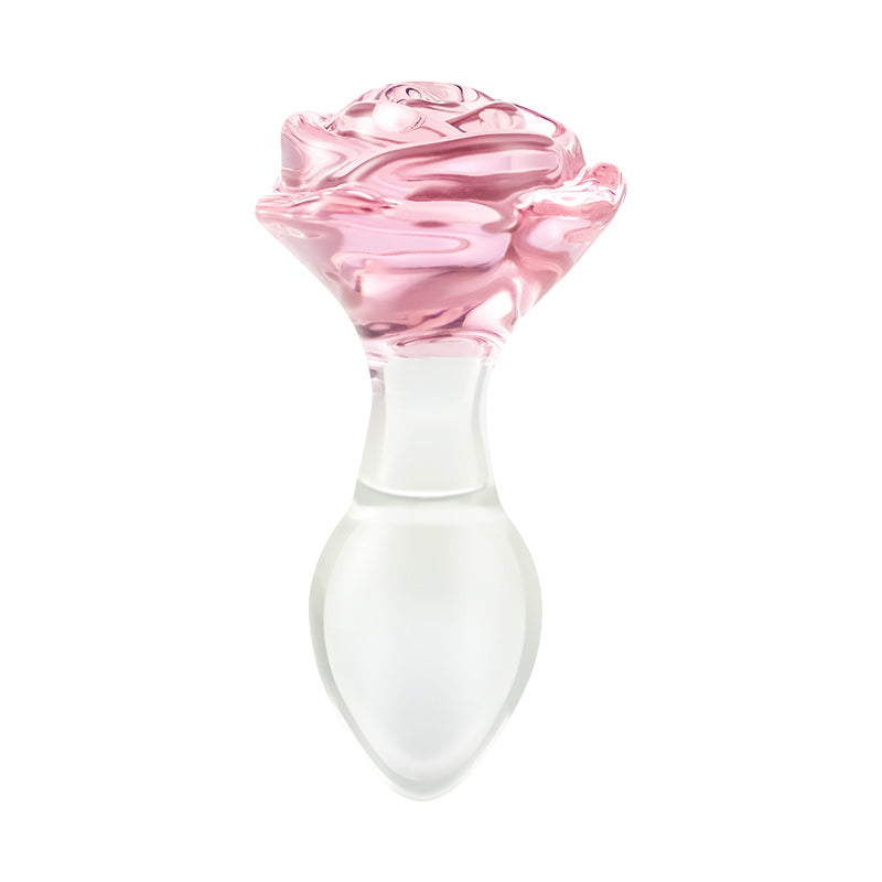 Analplugg i glas med bas av rosa rosor